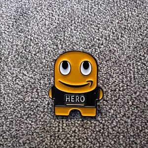 Yellow 'Hero' Amazon Peccy Enamel Pin
